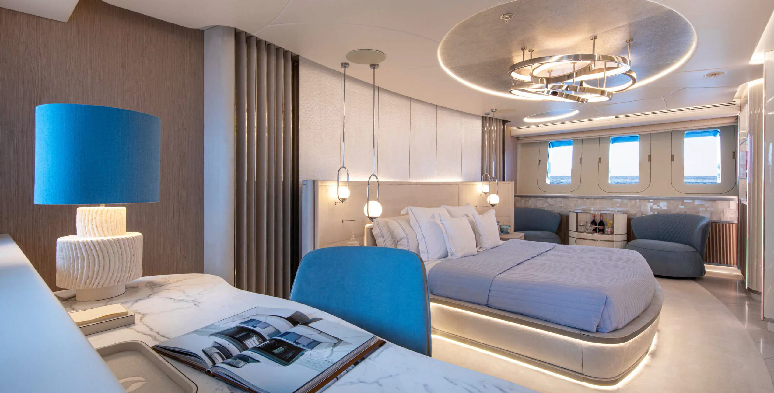 a room with a bed and a couch aboard OCEANBIRD Yacht for Sale
