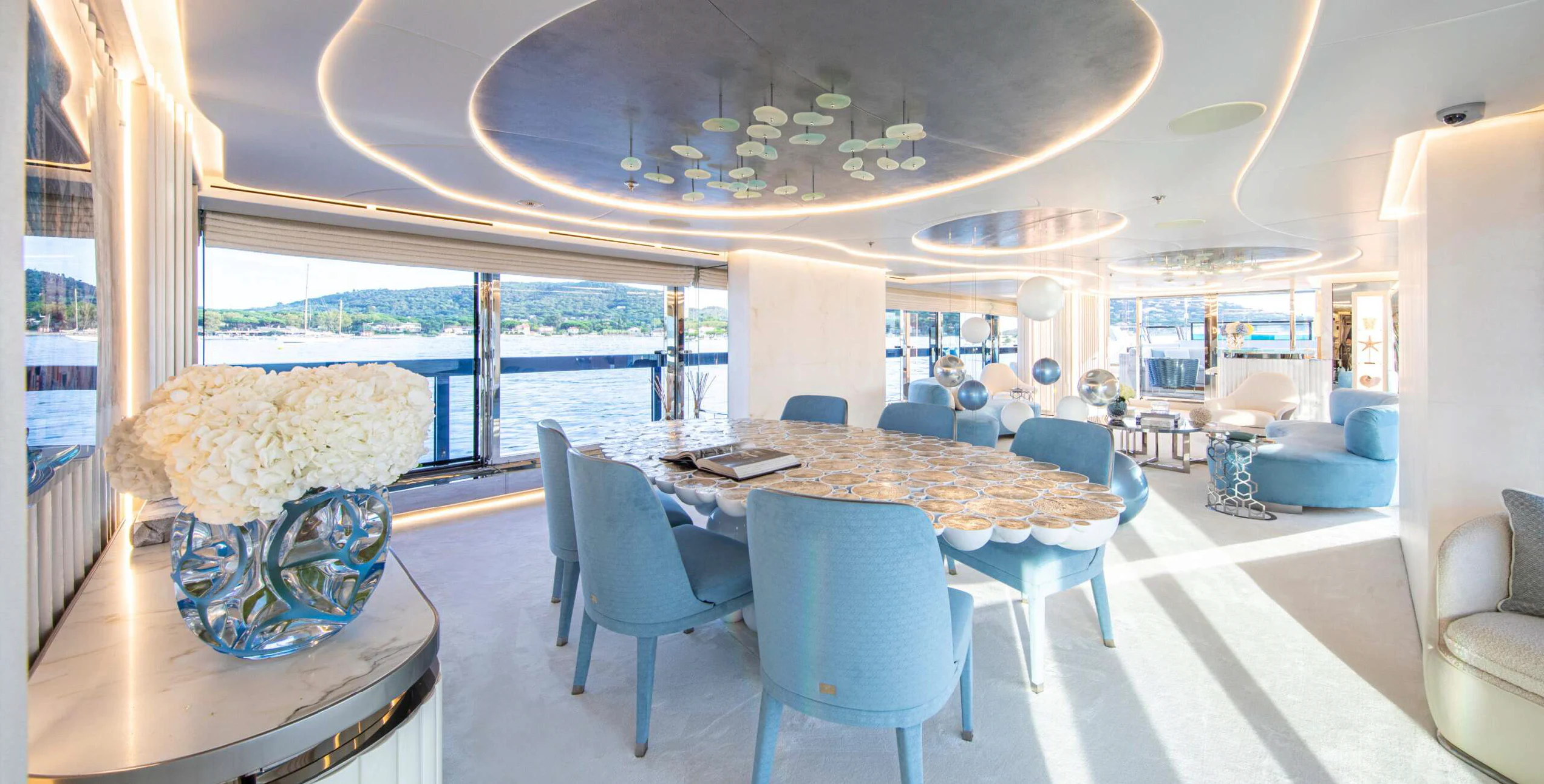 a large dining room with a large table and chairs aboard OCEANBIRD Yacht for Sale