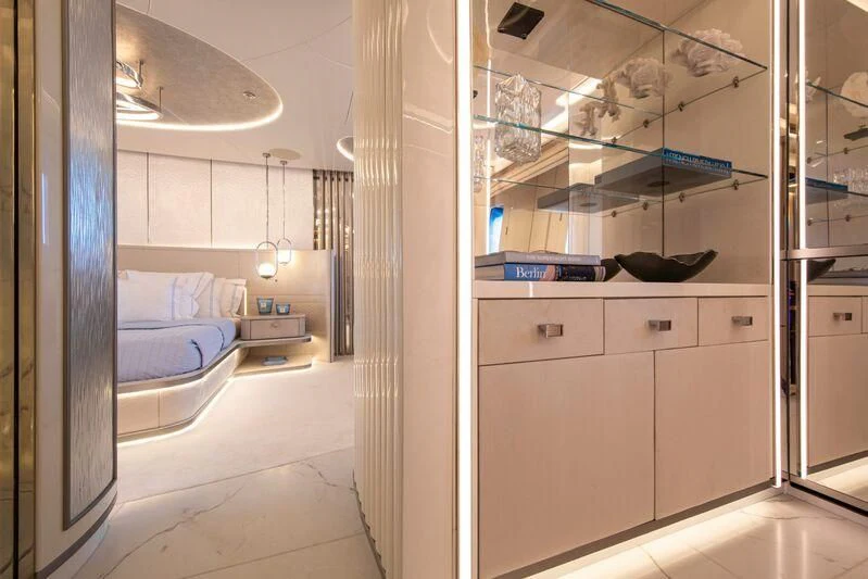 a bathroom with a tub sink and cabinets aboard OCEANBIRD Yacht for Sale