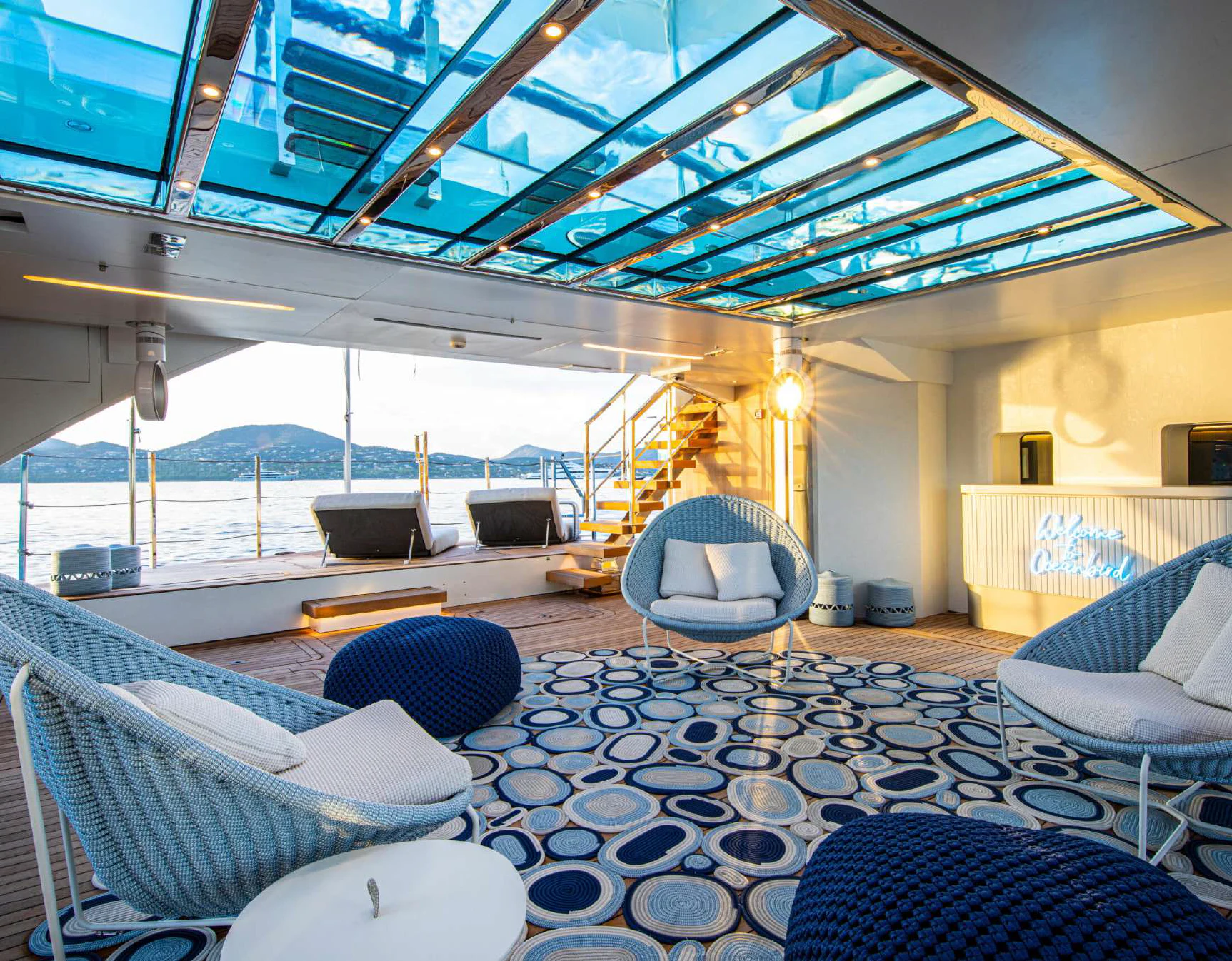 a room with a large pool table and chairs aboard OCEANBIRD Yacht for Sale