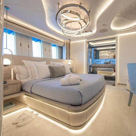 a large bed in a room aboard OCEANBIRD Yacht for Sale