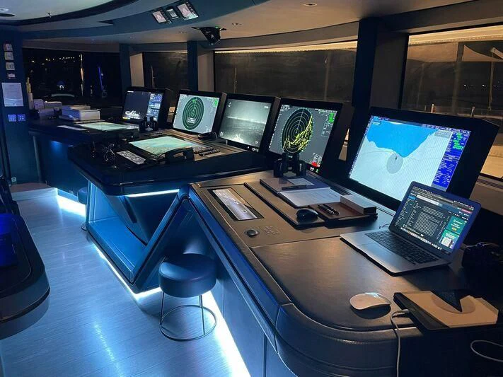 a room full of computers aboard OCEANBIRD Yacht for Sale