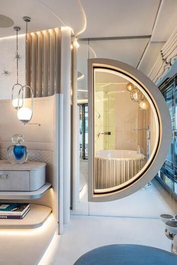 a bathroom with a large mirror aboard OCEANBIRD Yacht for Sale