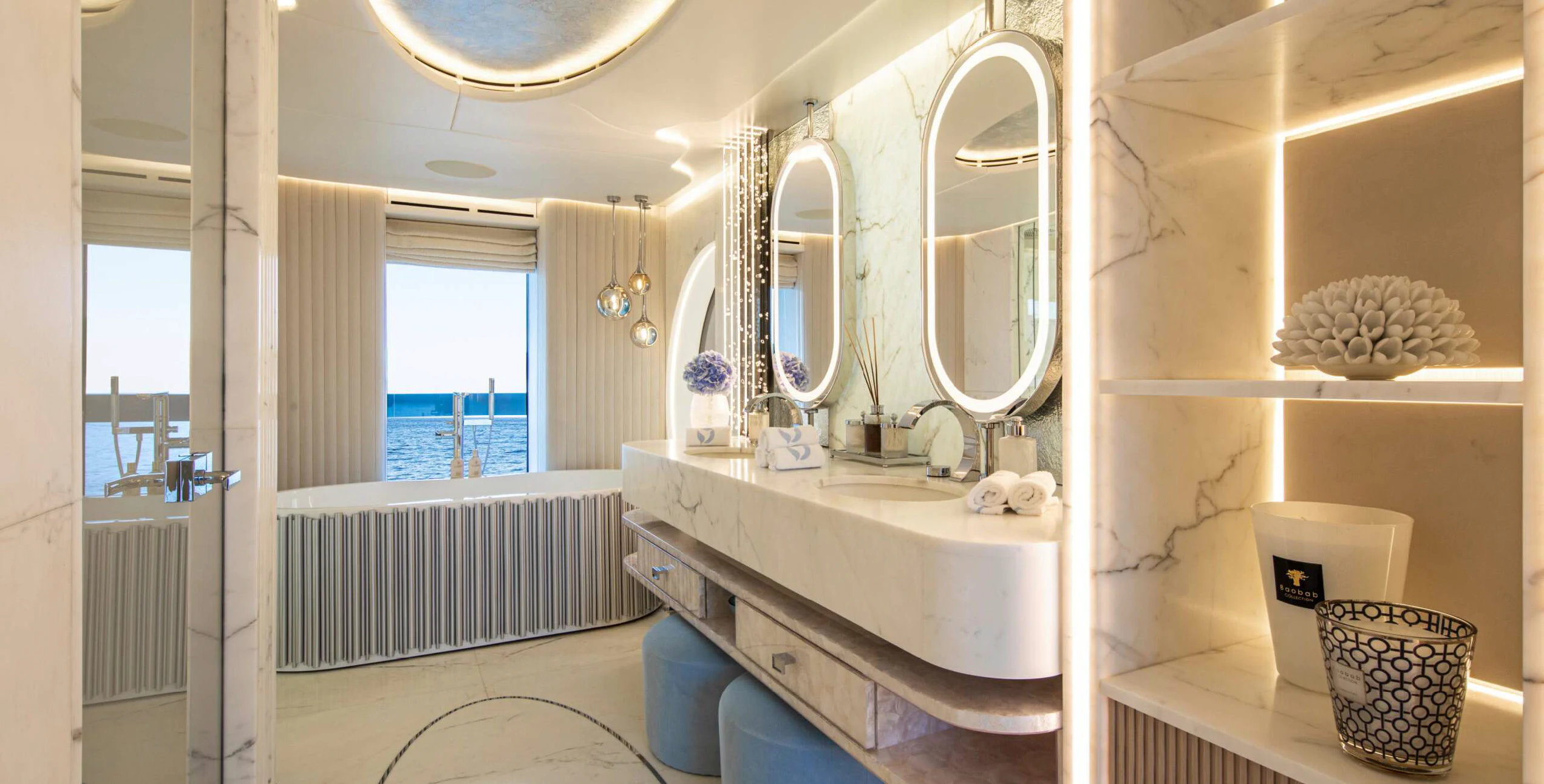 a bathroom with a sink and a mirror aboard OCEANBIRD Yacht for Sale