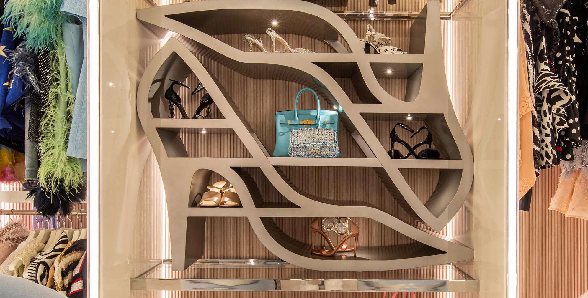a cat climbing a spiral staircase aboard OCEANBIRD Yacht for Sale