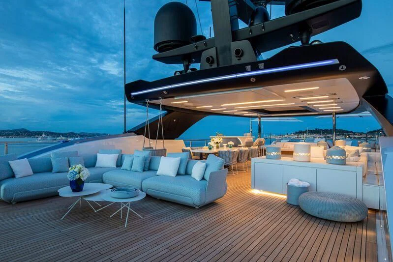 a room with a large white and black boat on the roof aboard OCEANBIRD Yacht for Sale