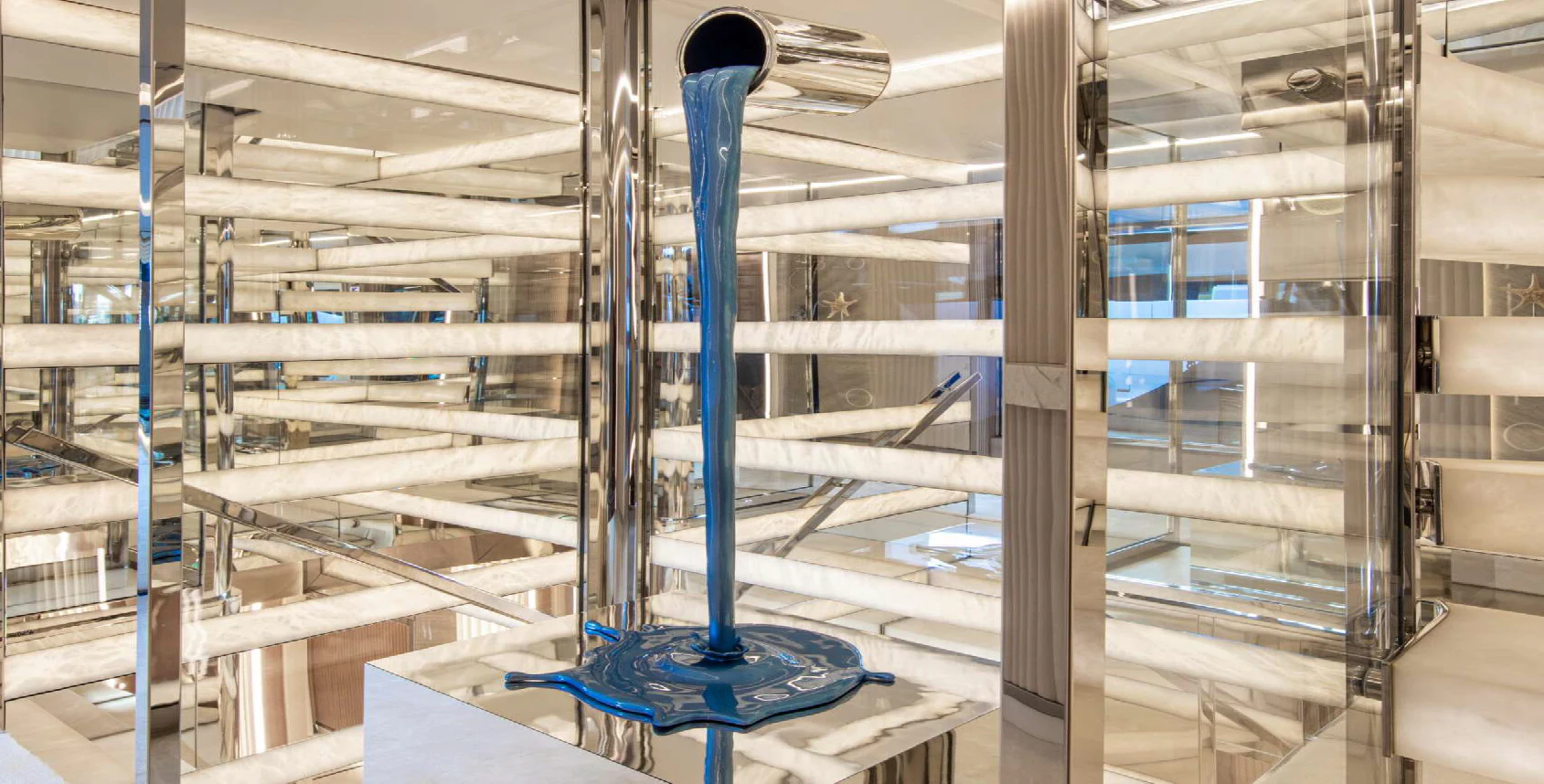 a large blue pipe in a factory aboard OCEANBIRD Yacht for Sale