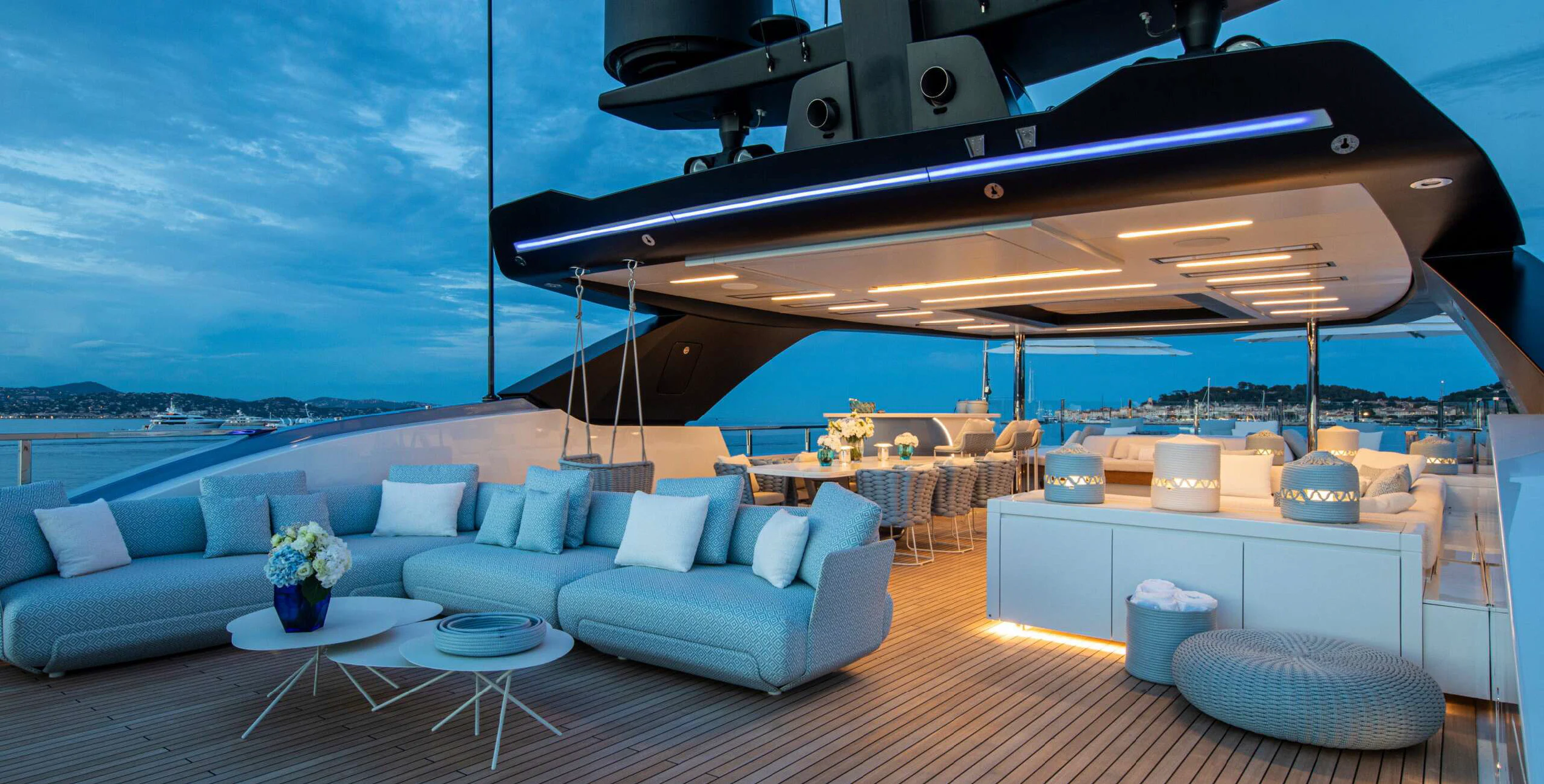 a living room with a large sofa aboard OCEANBIRD Yacht for Sale