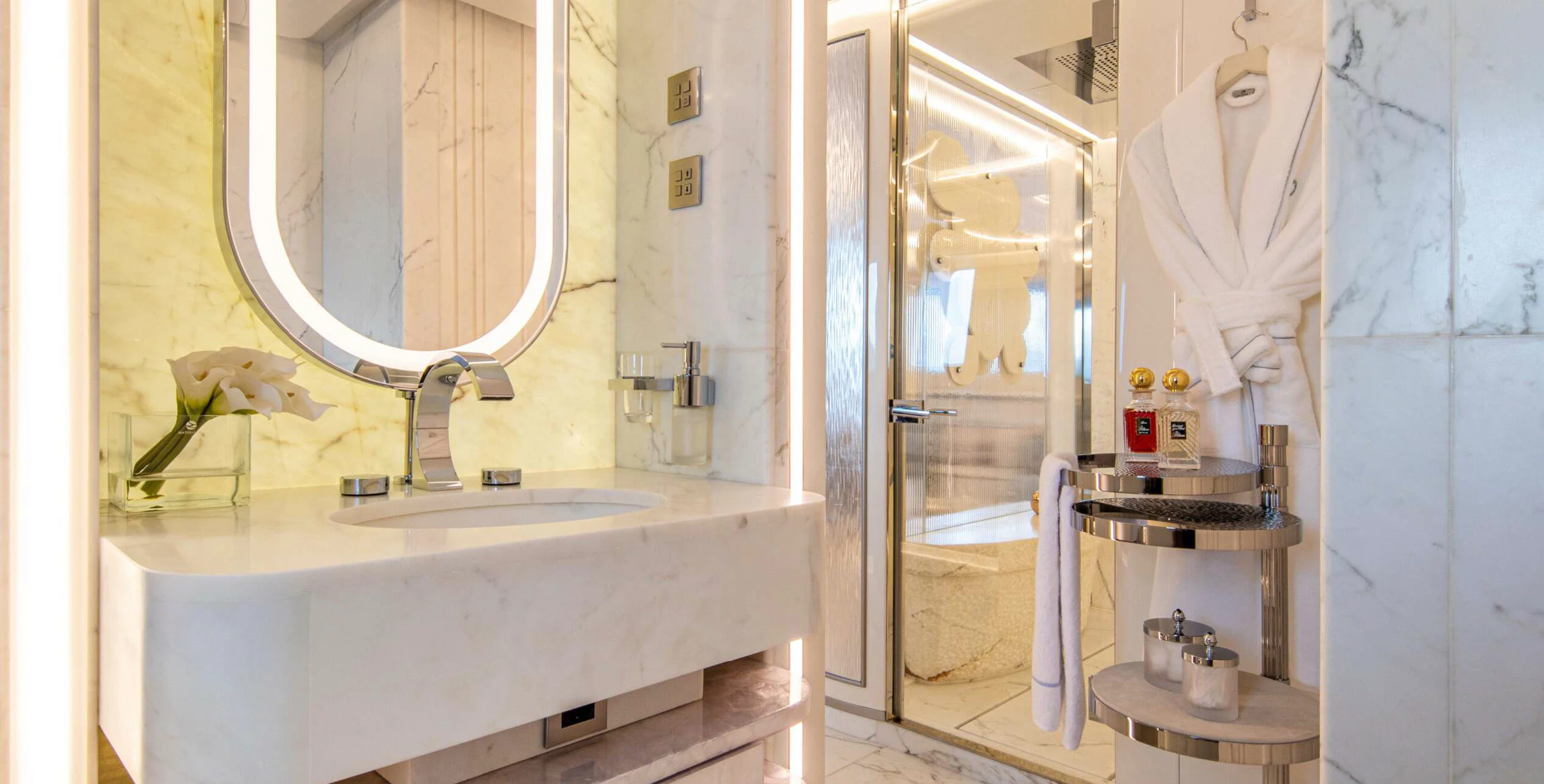 a bathroom with a sink and mirror aboard OCEANBIRD Yacht for Sale