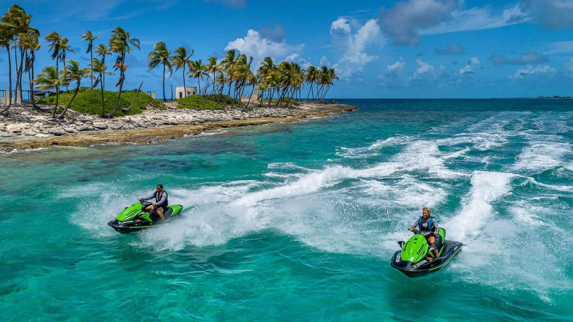 a man riding a jet ski aboard EMRYS Yacht for Sale