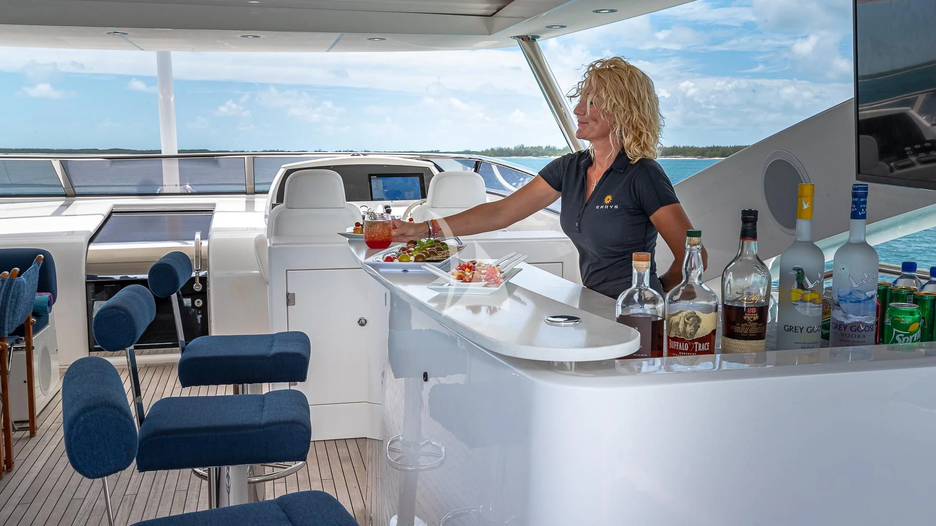 a person in a cockpit aboard EMRYS Yacht for Sale