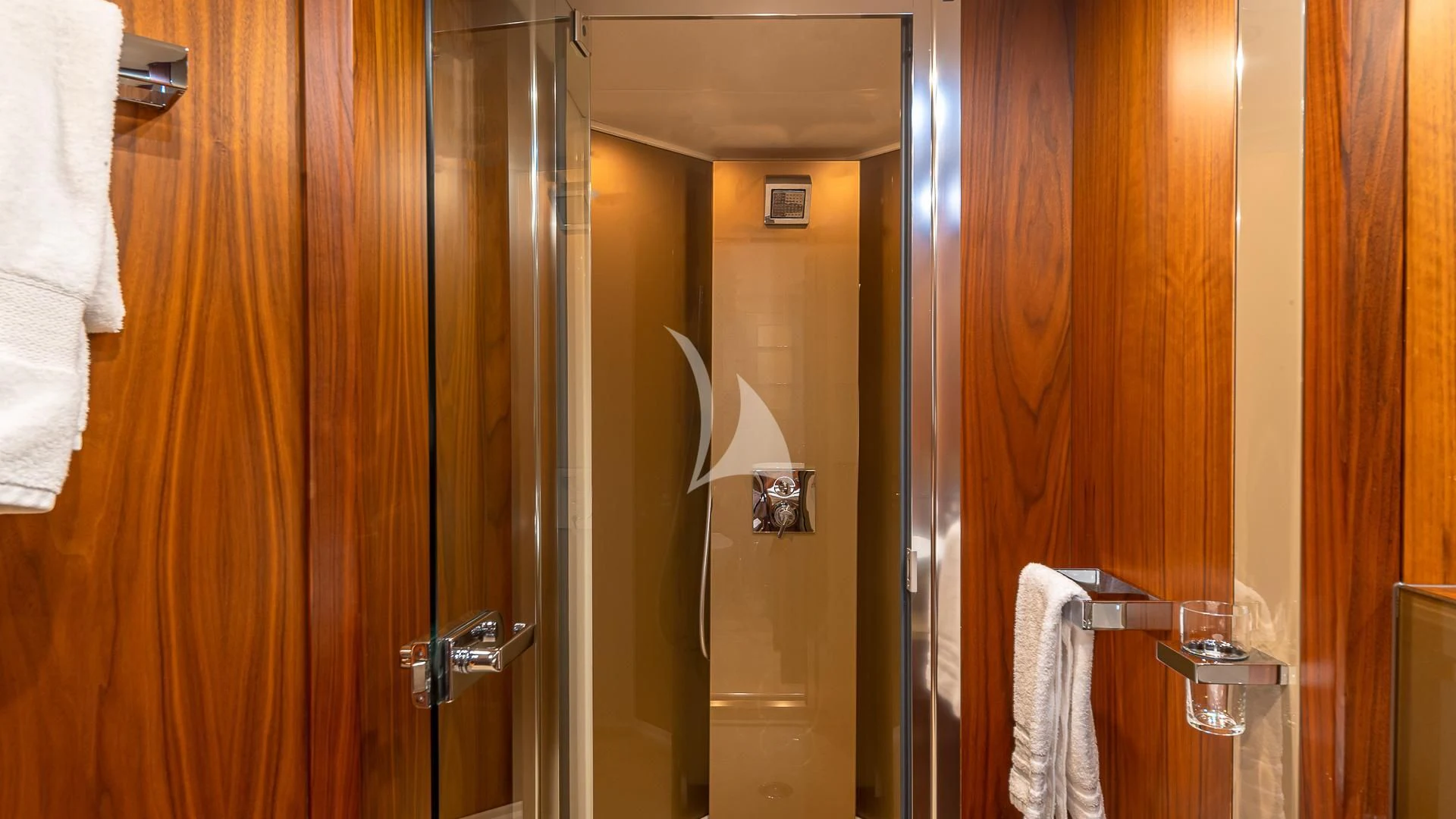 a bathroom with a glass door aboard EMRYS Yacht for Sale