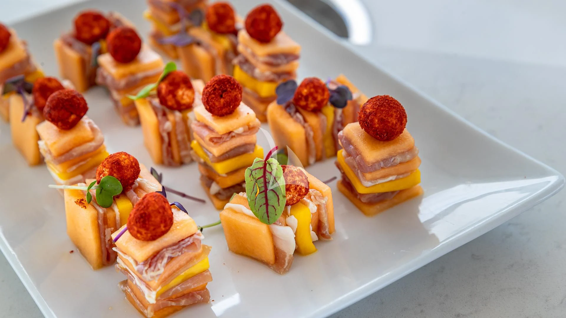 a plate of cupcakes aboard EMRYS Yacht for Sale