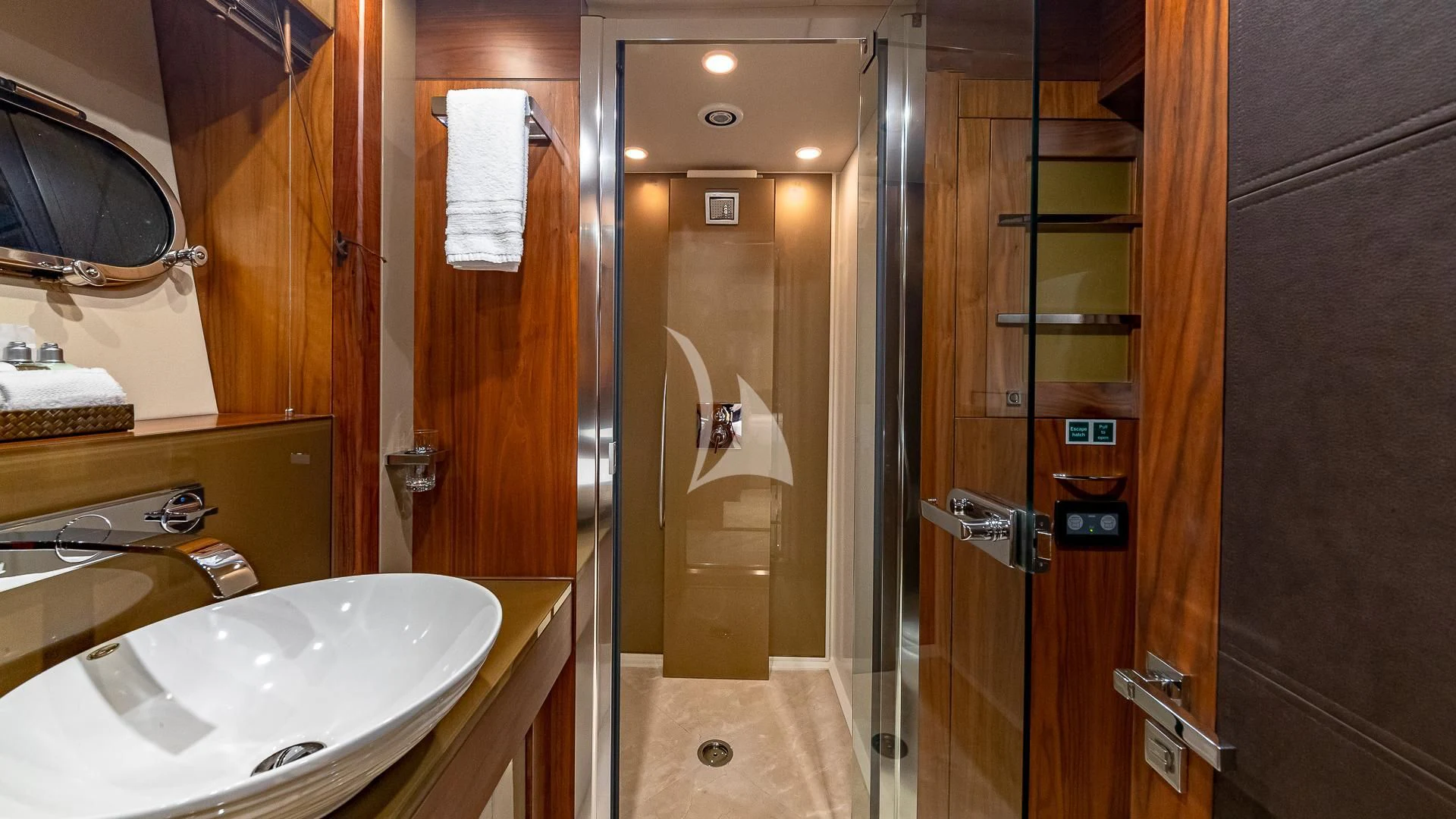 a bathroom with a sink and a shower aboard EMRYS Yacht for Sale