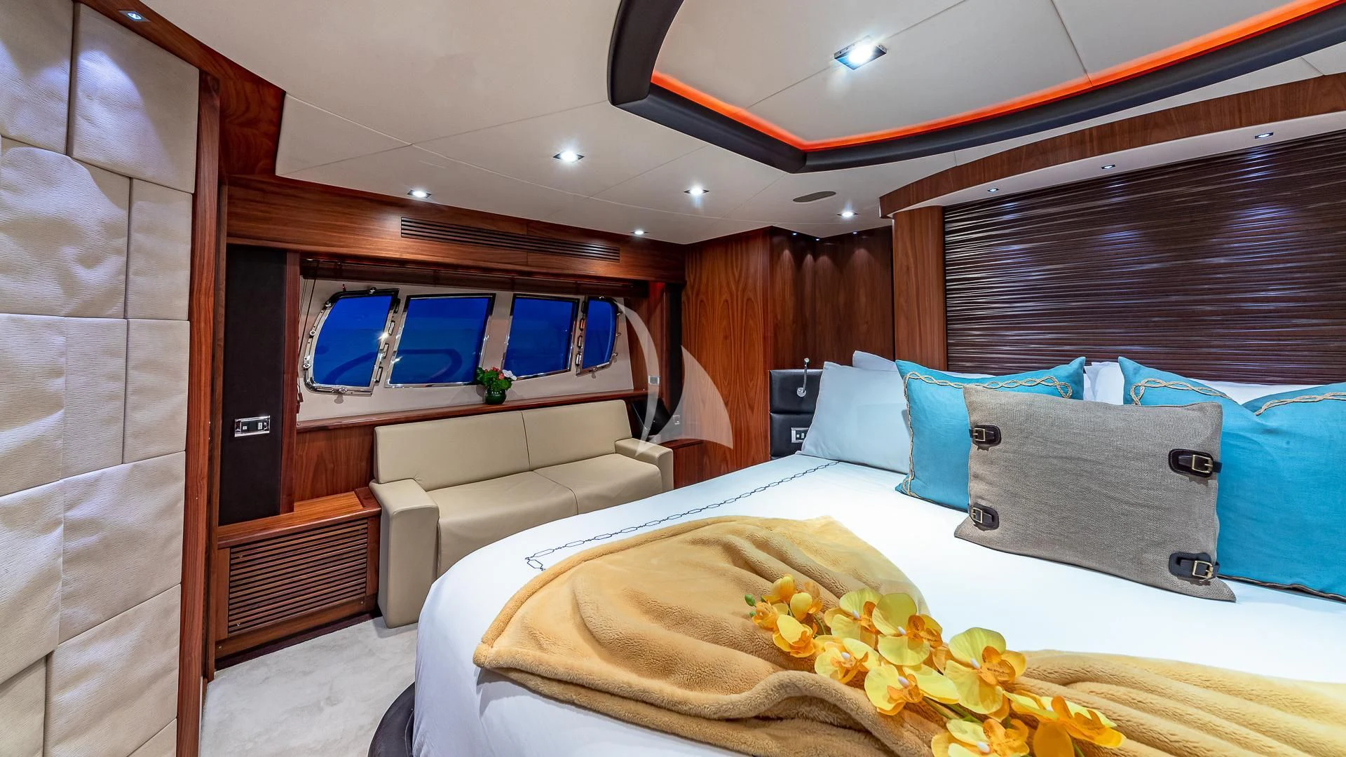a room with a bed and a wood wall aboard EMRYS Yacht for Sale