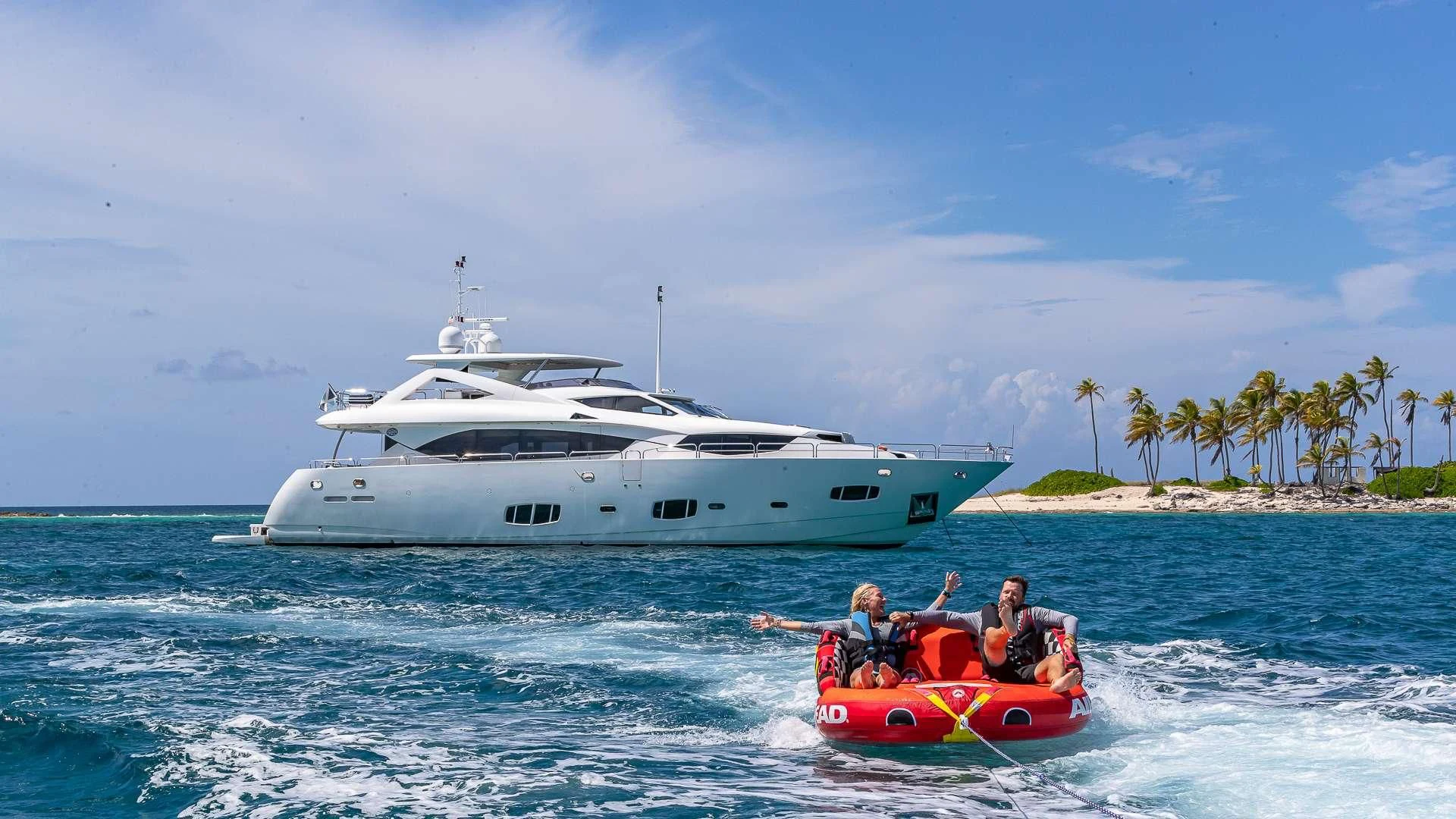 a group of people in a boat in the water aboard EMRYS Yacht for Sale