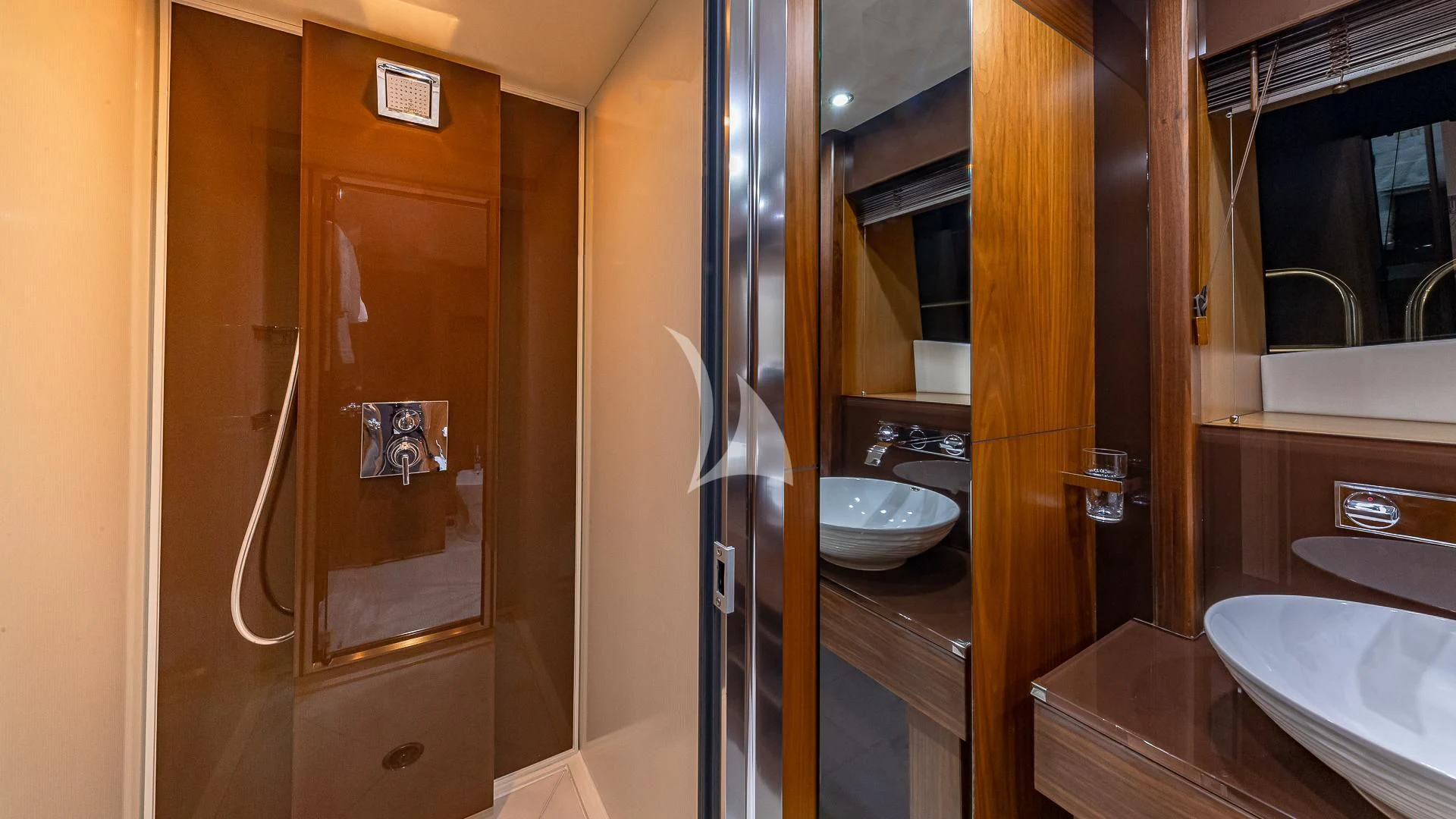 a bathroom with a sink and a shower aboard EMRYS Yacht for Sale