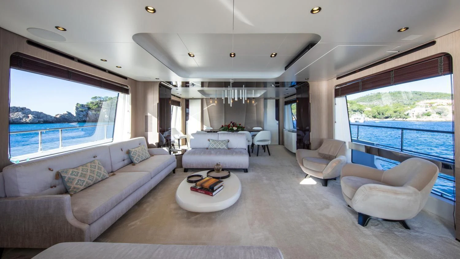 a living room with a large window aboard CLOUDY BAY Yacht for Sale