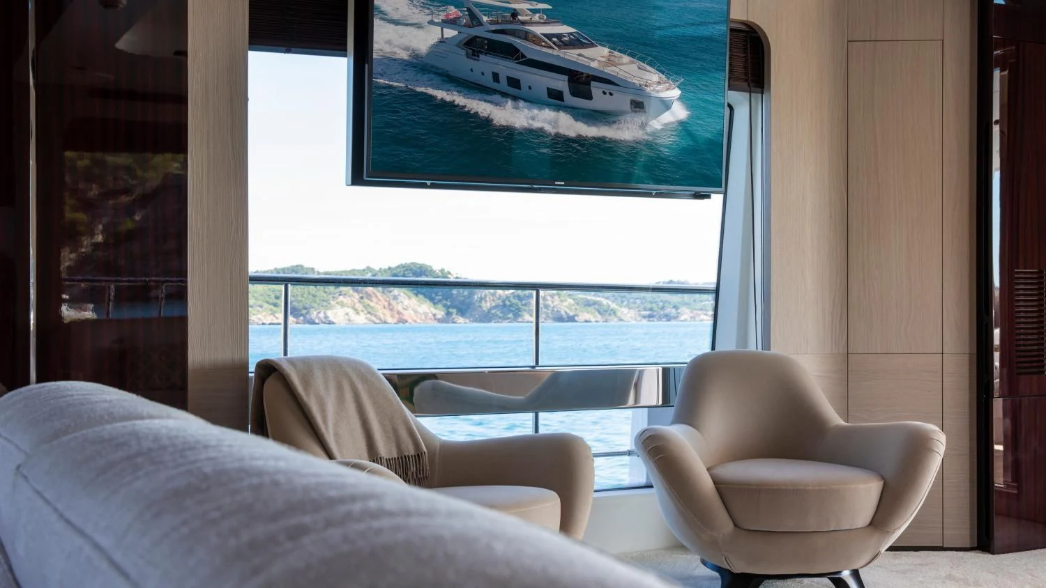 a room with a large window and a view of a city aboard CLOUDY BAY Yacht for Sale