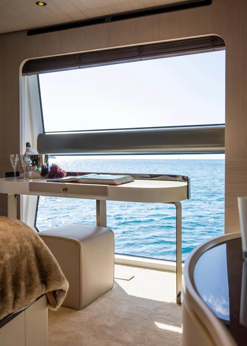 a room with a table and chairs aboard CLOUDY BAY Yacht for Sale