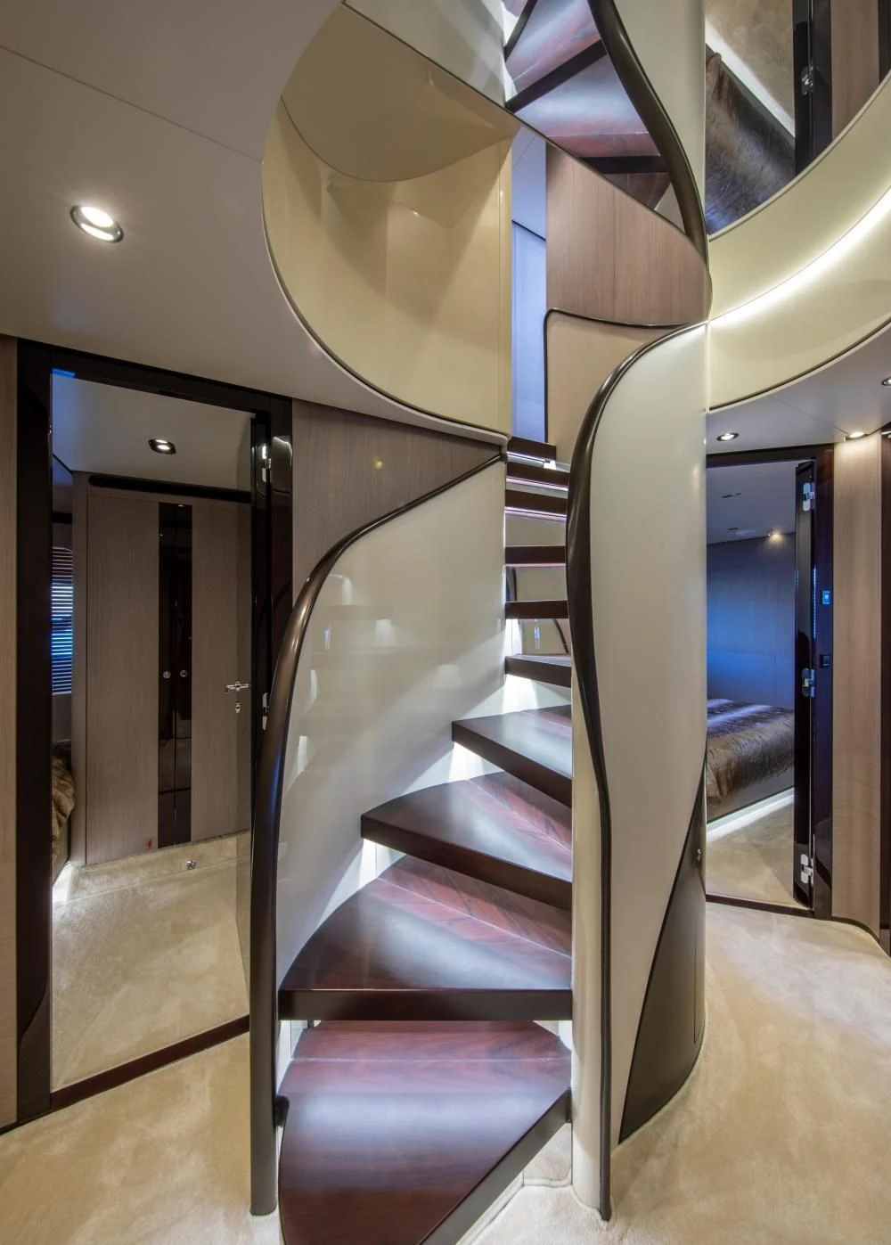 a staircase with a ceiling fan aboard CLOUDY BAY Yacht for Sale