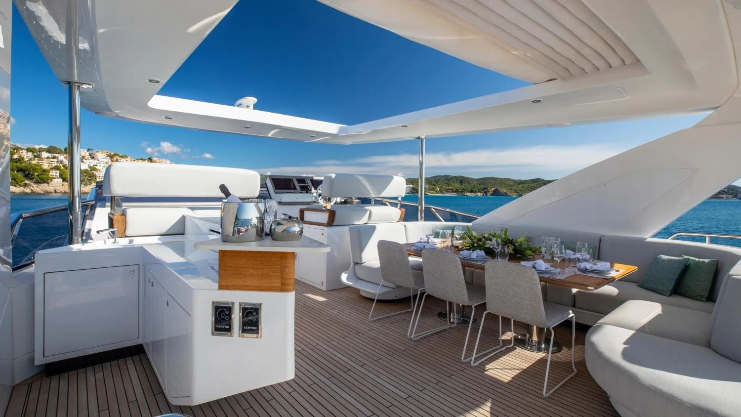 a large white tent with a table and chairs aboard CLOUDY BAY Yacht for Sale