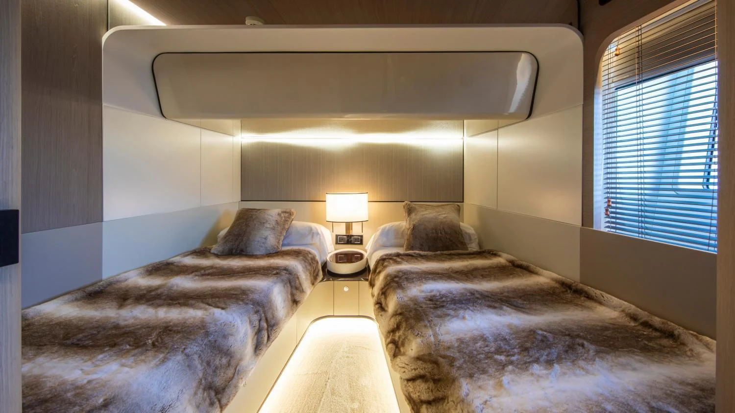 a couple of beds in a hotel room aboard CLOUDY BAY Yacht for Sale