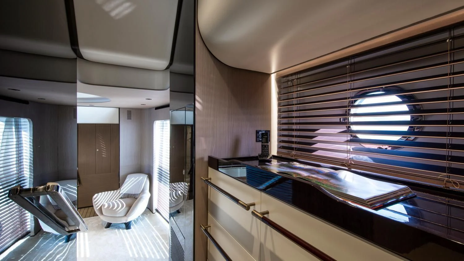 a room with a large window aboard CLOUDY BAY Yacht for Sale