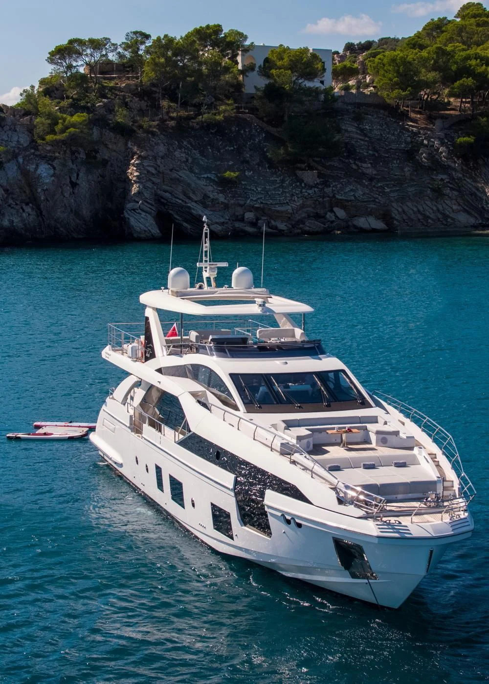 a white boat on the water aboard CLOUDY BAY Yacht for Sale