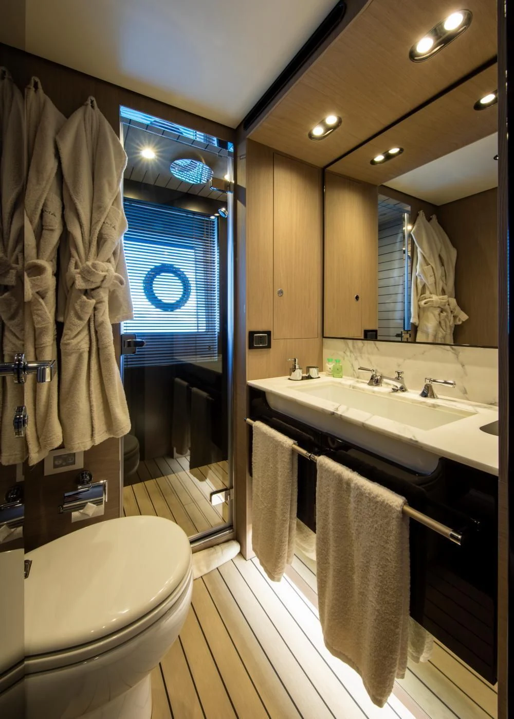 a bathroom with a sink and a toilet aboard CLOUDY BAY Yacht for Sale