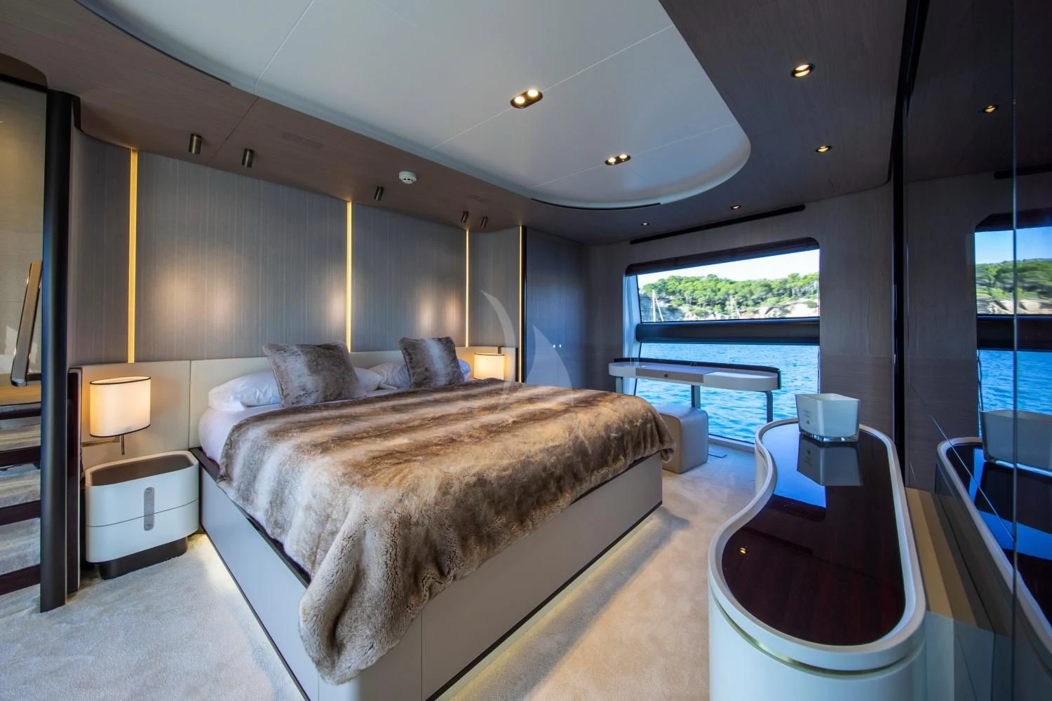 a bedroom with a large bed aboard CLOUDY BAY Yacht for Sale