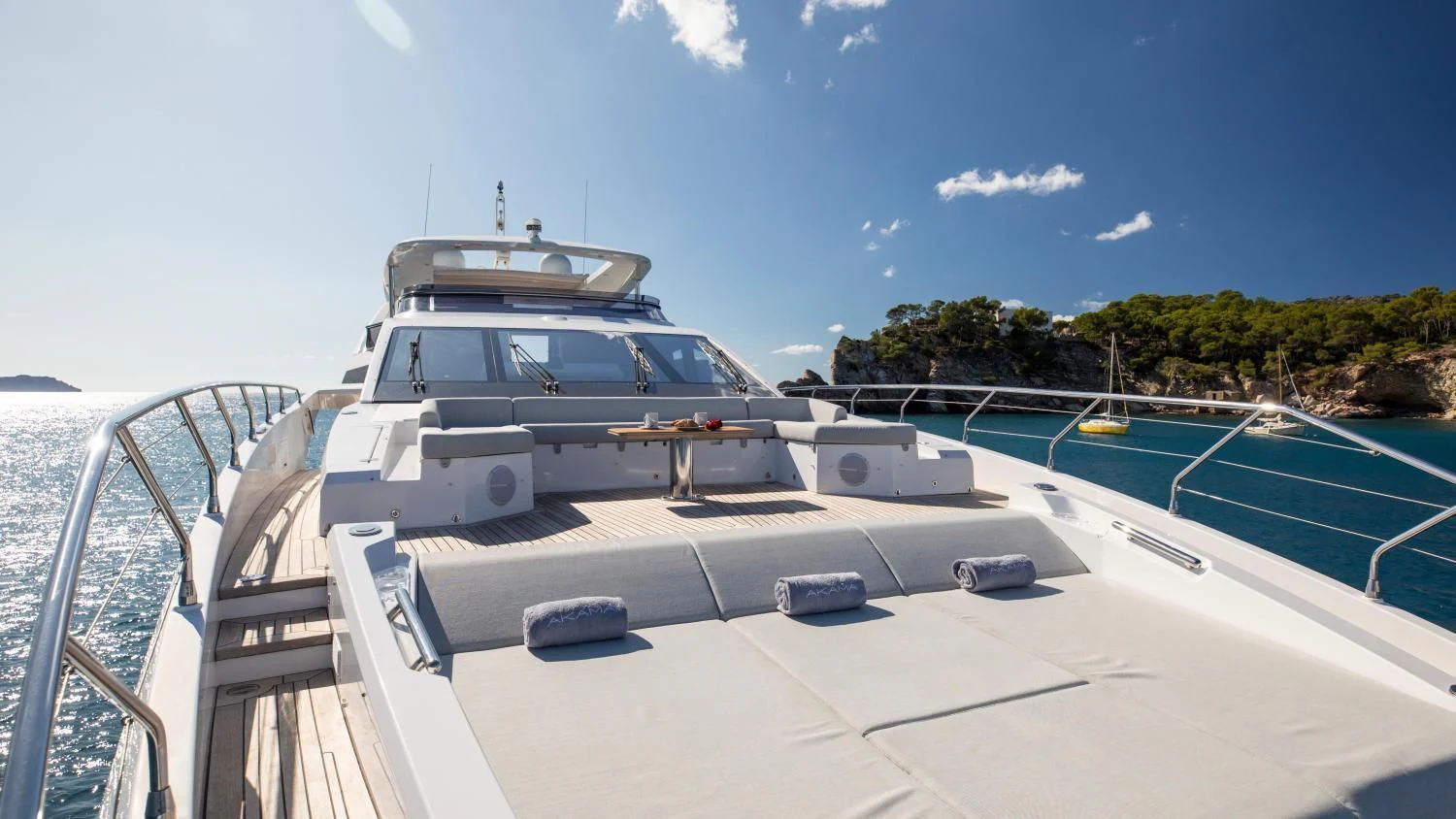 a white car on a boat aboard CLOUDY BAY Yacht for Sale