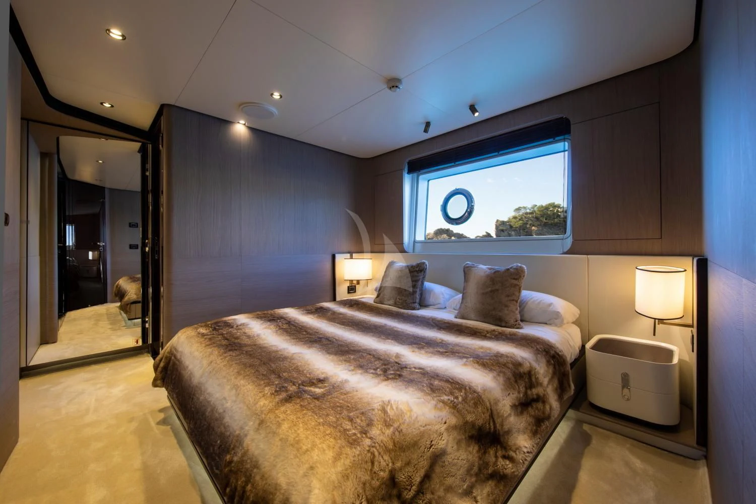 a bedroom with a large bed aboard CLOUDY BAY Yacht for Sale