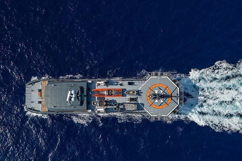 a building with a clock on it aboard HODOR Yacht for Charter