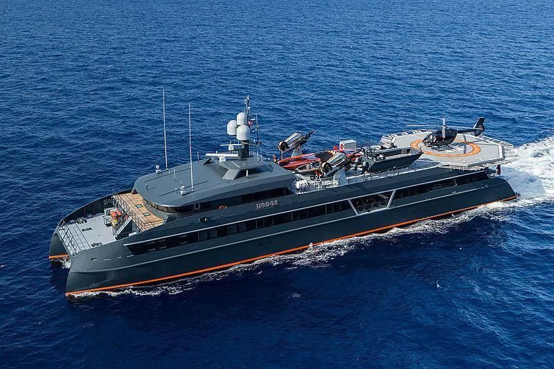 a large ship in the water aboard HODOR Yacht for Charter