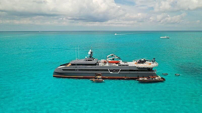 a large ship in the water aboard HODOR Yacht for Charter