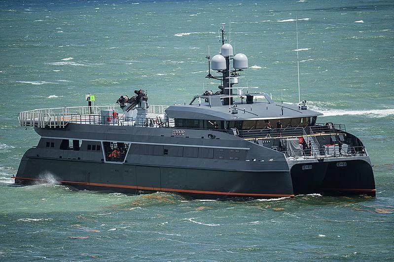 a large ship in the water aboard HODOR Yacht for Charter