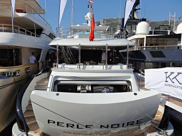a boat with a red flag on the front aboard AILISH V Yacht for Sale