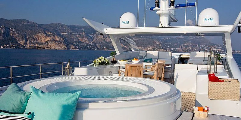 a large white house with a pool aboard AILISH V Yacht for Sale