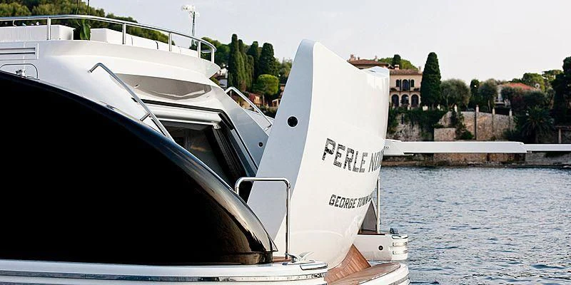 a white boat on the water aboard AILISH V Yacht for Sale