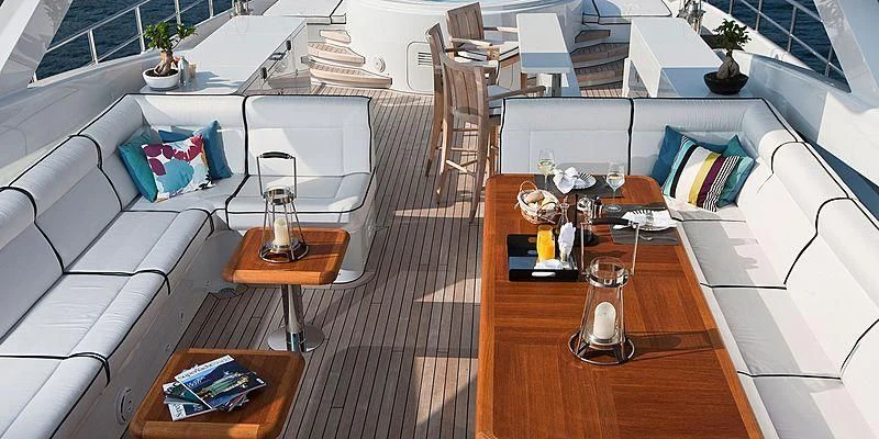 a room with a couch and a table aboard AILISH V Yacht for Sale