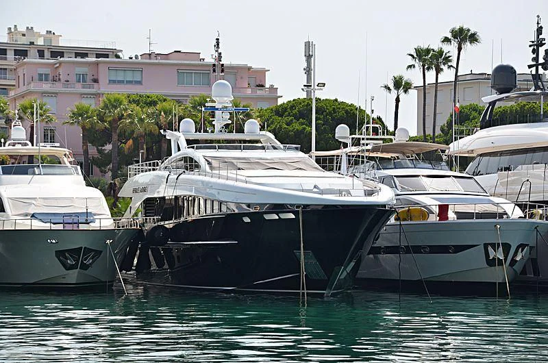 several boats docked in a harbor aboard AILISH V Yacht for Sale