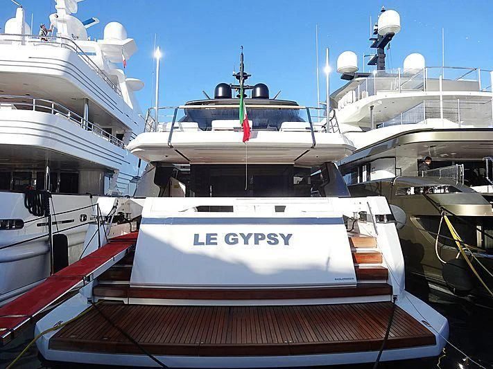 a boat docked at a pier aboard PIOLA Yacht for Sale