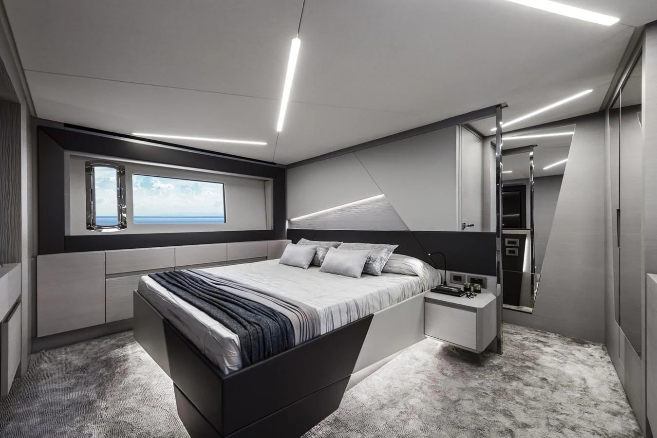 a bedroom with a bed aboard PERSHING 7X Yacht for Sale