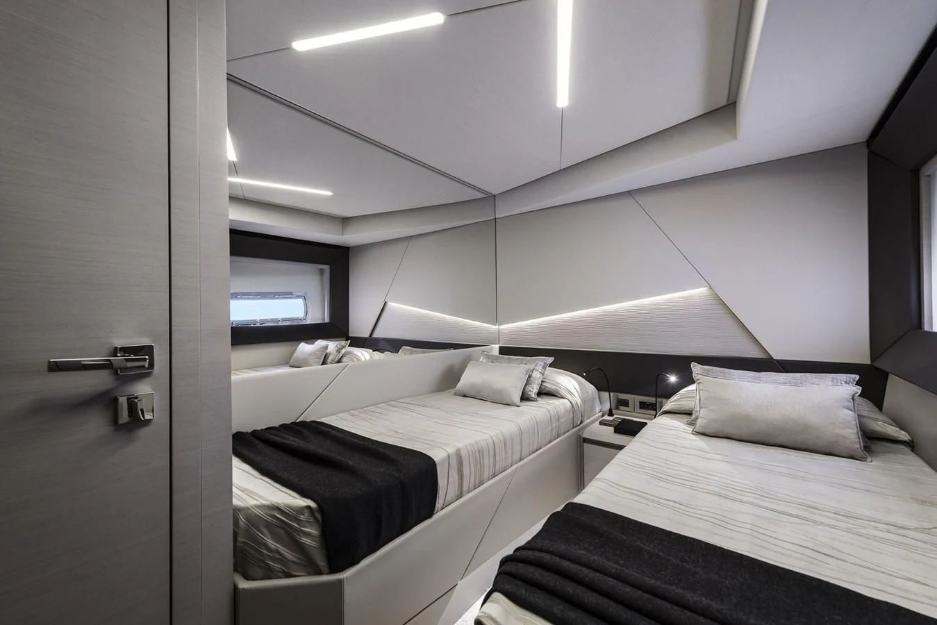 a room with two beds aboard PERSHING 7X Yacht for Sale