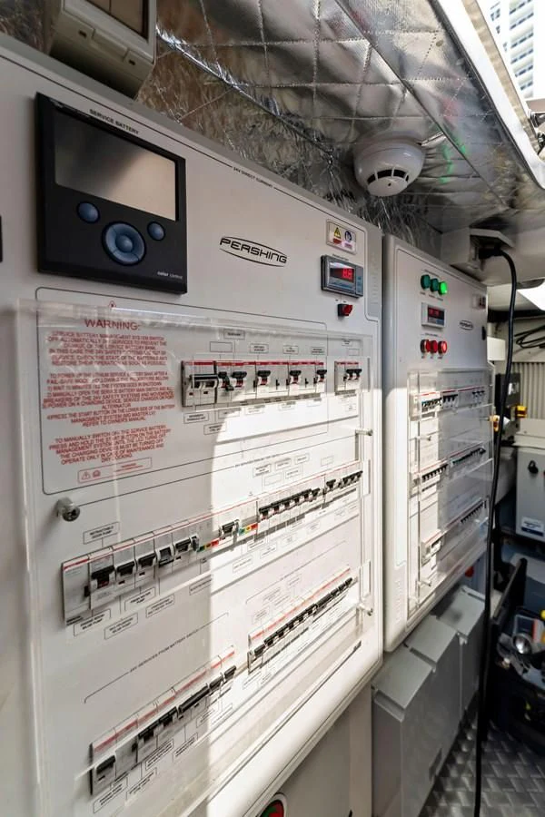 a white board with a screen and buttons aboard PERSHING 7X Yacht for Sale