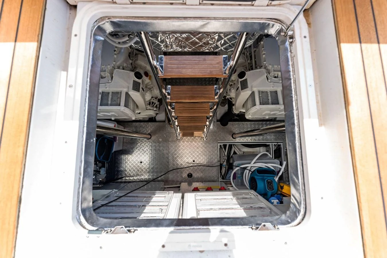 a car with its door open aboard PERSHING 7X Yacht for Sale