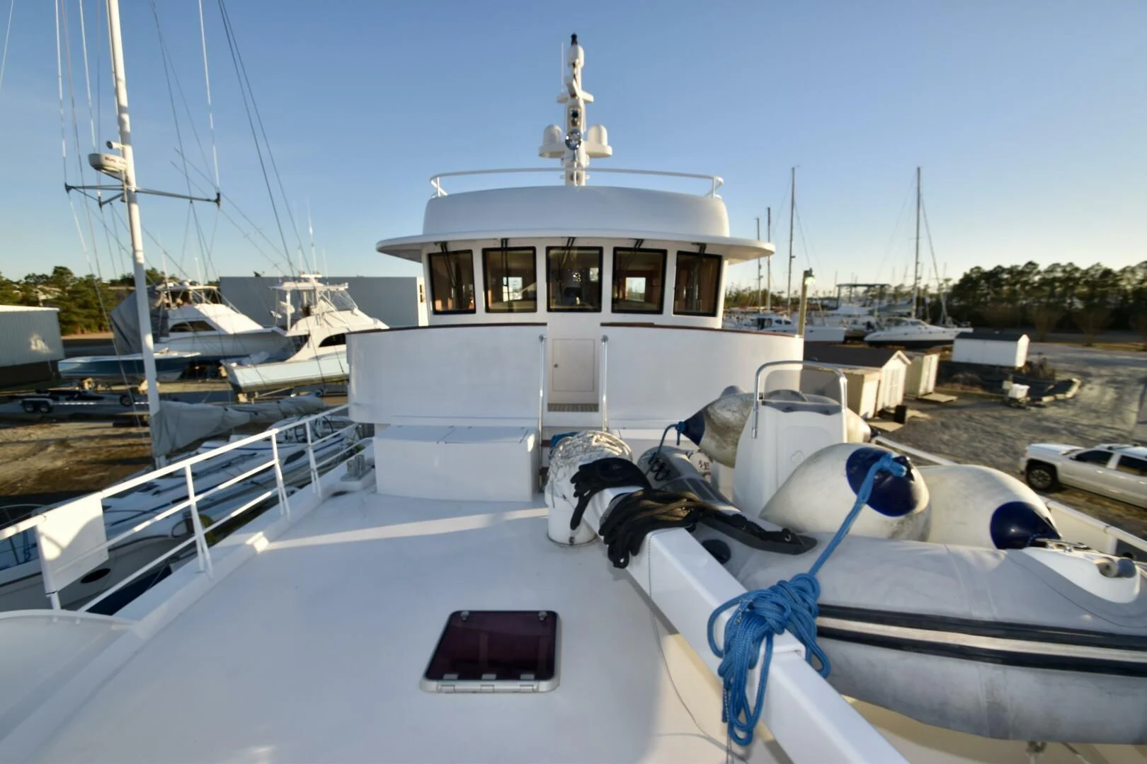 a boat docked at a pier aboard BLUE SEAS Yacht for Sale