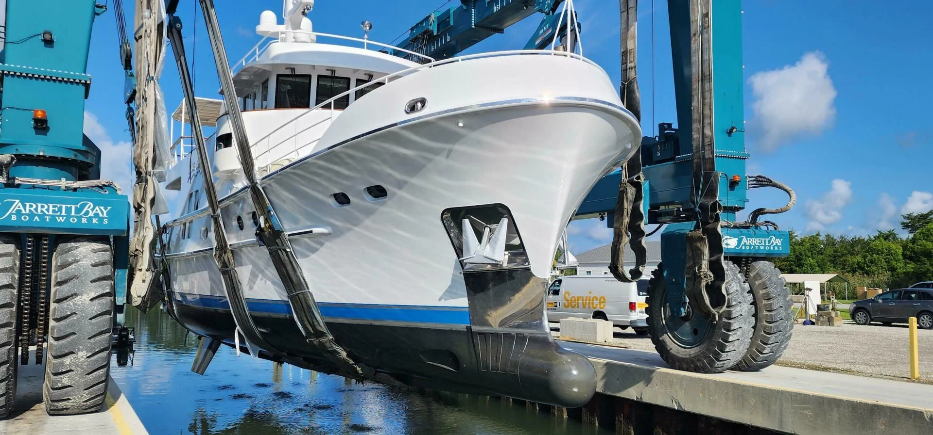 a large white boat with large wheels aboard BLUE SEAS Yacht for Sale
