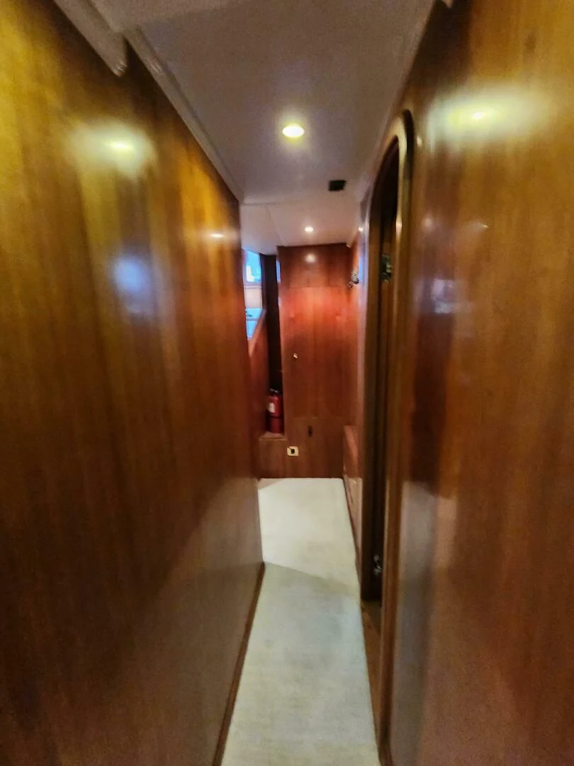 a hallway with a door aboard BLUE SEAS Yacht for Sale